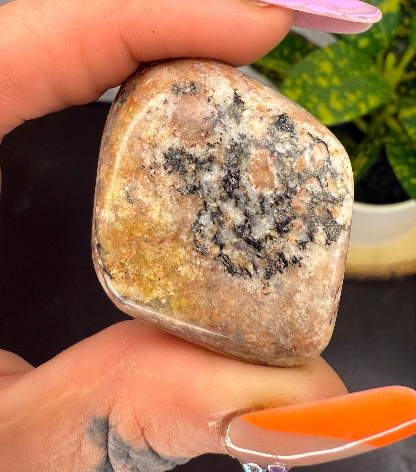 Hand polished sunstone palm stone